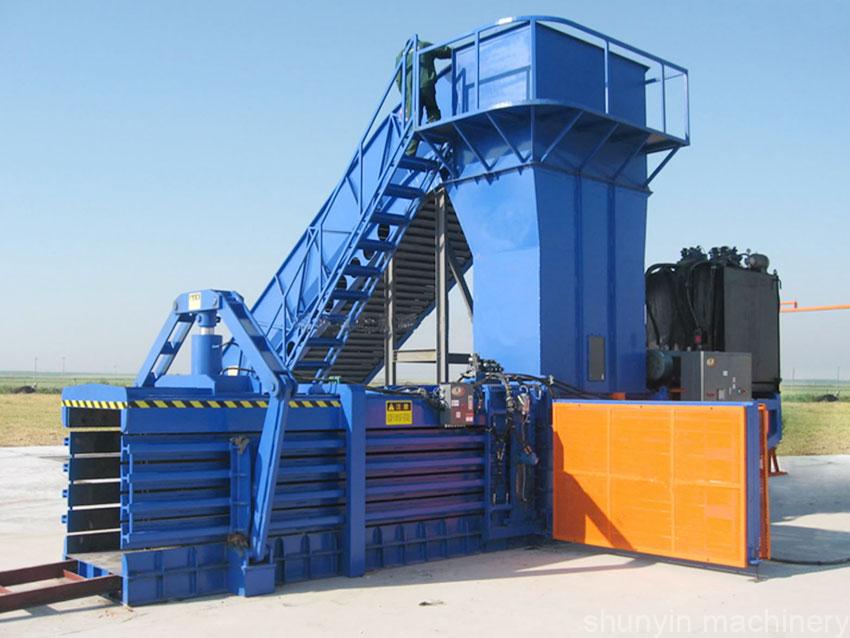  Automatic horizontal baler for hands-free, high-speed waste management solutions.  