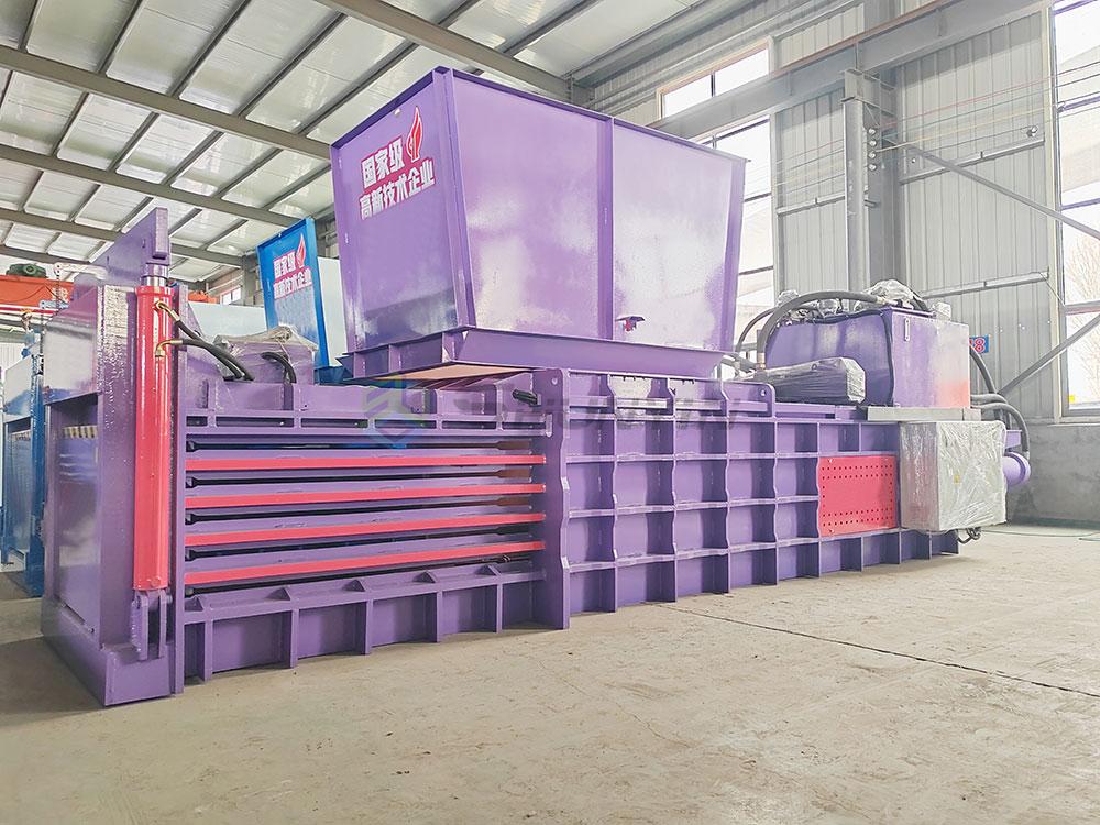 Cutaway diagram showing horizontal baler machine mechanics