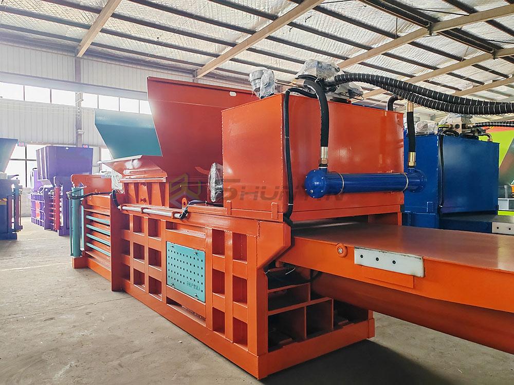 AI-controlled horizontal baler panel with real-time density metrics