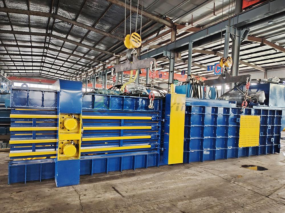 Recycling facility using horizontal hydraulic baler machine efficiently