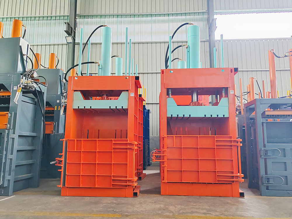 industrial vertical baler compressing textiles