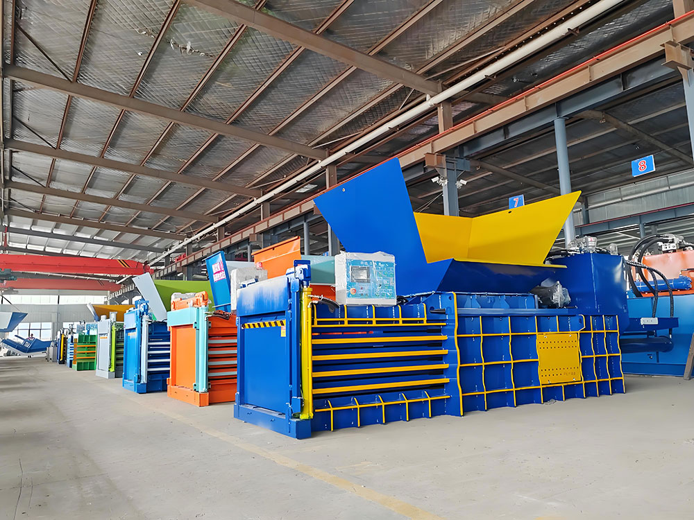 Horizontal hydraulic baler compacting cardboard